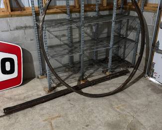 Large metal frame for Texaco sign with hanging bar; no sign
