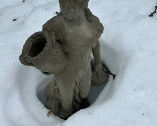 Many pieces of garden art are starting to peek through the snow! Additional photos will be added as we find them!