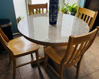 Stone-topped round table with 4 Oak chairs