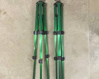 Orbit Brass Impact Sprinklers on Green Metal Tripods