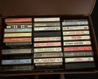 Vintage Suitcase with Assorted Cassette Tapes
