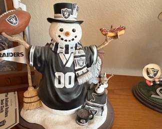 Oakland Raiders Snowman Figurine with Donut and Broom