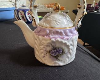 Vintage Porcelain Teapot with Floral Motif and Gilt Accents