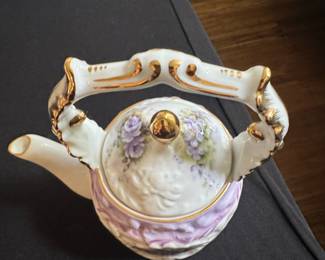 Vintage Porcelain Teapot with Floral Motif and Gilt Accents