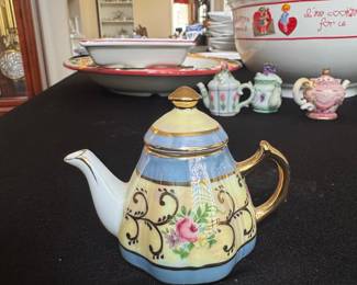 D.N. & E.I. Porcelain Teapot Figurine