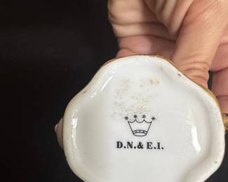 D.N. & E.I. Porcelain Teapot Figurine