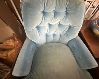 Tufted blue armchair