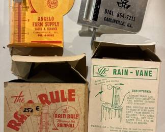 Vintage Carlinville rain gauges