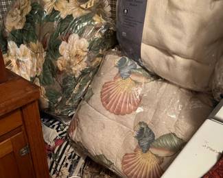 Lots of new comforters in original packaging