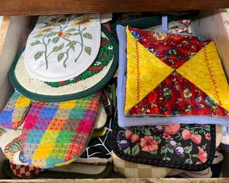 Drawer full of new pot holders
