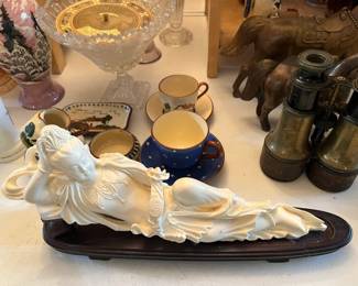Faux ivory reclining Guanyin (Goddess of Mercy)