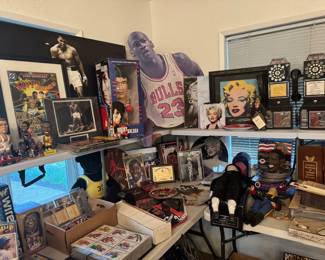 Celebrity and sports memorabilia room featuring basketball, boxing, Hollywood, presidential collectibles, rotary pay phones, framed pop art, records, cards, and vintage display pieces. Great mix of Michael Jordan, Marilyn Monroe, Muhammad Ali, Rocky, Obama, and Americana items for collectors and resellers.