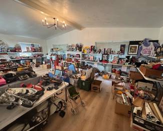 Packed picker’s antique sale room loaded with vintage collectibles, sports memorabilia, signs, toys, framed art, decor, and boxes of undiscovered treasures. Tables and shelves are full throughout the house with something in every corner—great mix for collectors, resellers, and treasure hunters.