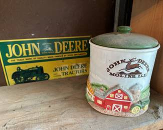 John Deere canister and metal sign