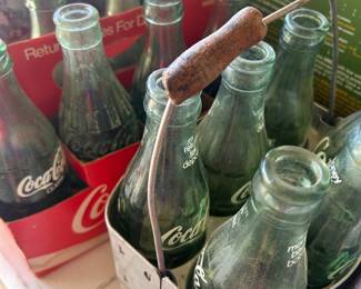 Vintage Coca Cola bottles with trays