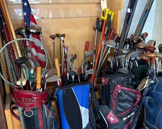 6 sets of golf clubs…
