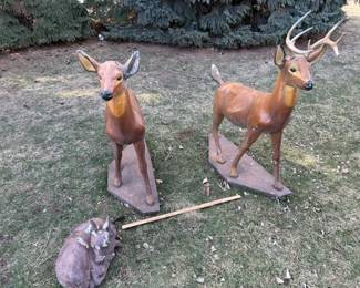 Circa 1965 cement lifesize deer family.