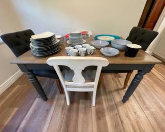 Casual indoor dining table, rectangle, four chairs, everyday dishes and serving platters