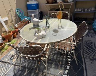 patio table and four chairs; also nice set cushions