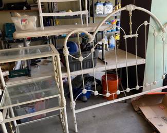 painted iron headboard and two iron and glass lamp tables