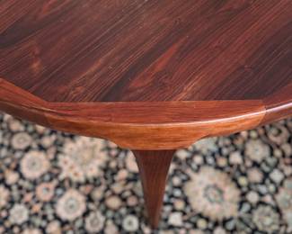 Mid-Century Modern Rosewood Extension Dining Table Likely Danish. Measures 48" D with Two 20" Leaves. Comes with Pads. Photo 3 of 4.