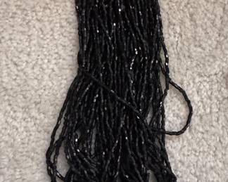 Multi-Strand Glass Bead Necklace. 