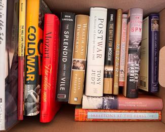 Books including Postwar by Tony Judt, "The Splendid and the Vile," by Erik Larson, "Wealth & Democracy," Kevin Phillips, etc. 