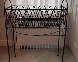Wrought Iron Planter. Measures 10" w x 27" H x 31" H. 