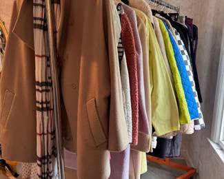 Racks of Designer Clothing and Outerwear Including 2 Mink Coats in Sizes S - 2XL. Brands Include Carlise, Theory, Ralph Lauren, Chanel, Hermes, Brooks Brothers, Vince, Cynthia Rowley, Rachel Zoe, & More! Shoes in Sizes 6 - 8. Photo 1 of 4. 
