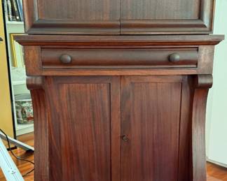 American Empire, turn of the 20th century bar cabinet with copper lined pull-out mixing surface, cold storage, bottle storage, and waste bin.