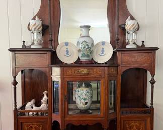 Edwardian-style display cabinet holds Porcelain, Glass, and Ceramic Treasures