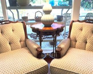 Country French style lounge Seating flank a marquetry inlaid table with pierced gallery edge 