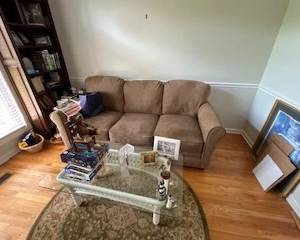 sofa, table, books, pictures