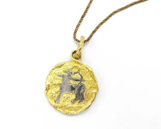 This elegant Chaumet Zodiac pendant necklace is crafted in solid 18K yellow and white gold and features the Sagittarius zodiac motif in a detailed coin medallion design. The textured gold surface and contrasting white gold figure reflect Chaumet’s timeless Parisian aesthetic and exceptional craftsmanship. This necklace represents a highly desirable and collectible example from Chaumet’s zodiac jewelry collection.