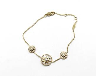 Elegant Dior Rose des Vents bracelet crafted in 18K yellow gold featuring a rare three motif design from the iconic collection. The bracelet showcases three compass rose medallions set with luminous mother of pearl and accented with central diamonds. Inspired by Christian Dior’s fascination with lucky stars and celestial navigation, this unique variation offers a refined and distinctive interpretation of the Rose des Vents collection.