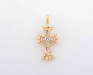 Iconic Chrome Hearts Tiny Fat Cross pendant top crafted in solid gold, featuring the brand’s bold gothic cross silhouette accented with brilliant diamonds throughout. The thicker profile and dimensional form give this piece a strong presence while maintaining refined detail and balance. A highly recognizable and collectible Chrome Hearts design.