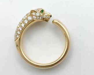 This exceptional Cartier Panthère ring is crafted in solid 18K gold and features the iconic panther motif, fully set with brilliant pavé diamonds that create remarkable brilliance and dimension. The sculptural design captures the strength and elegance of Cartier’s legendary panther symbol, reflecting bold luxury and refined craftsmanship. Featuring the highly sought-after full diamond pavé configuration, this ring represents a more collectible and desirable example from Cartier’s renowned Panthère collection.