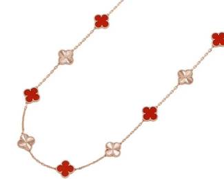 Crafted in solid 18K rose gold (750) with guilloché detailing Features twenty alternating Vintage Alhambra motifs in red carnelian and guilloché gold Van Cleef & Arpels Vintage Alhambra long necklace design
