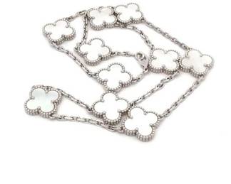 This elegant Van Cleef & Arpels Vintage Alhambra necklace is crafted in solid 18K white gold and features ten radiant White Mother of Pearl motifs, each reflecting soft, iridescent tones emblematic of the Maison’s timeless design. The cool white gold beautifully enhances the natural sheen of the mother of pearl, creating a refined and versatile piece suitable for both daily wear and elevated occasions. Presented with its original branded box, the necklace is in very good pre-owned condition and makes a sophisticated addition to any Alhambra collection.