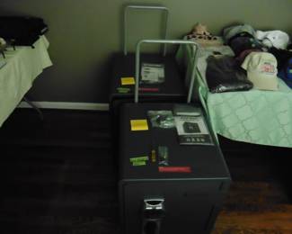 Safes with handles and rollers