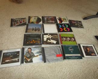 Large amount of rock CDs including local interest