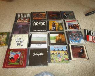 Large amount of rock CDs including local interest