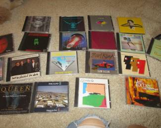 Large amount of rock CDs including local interest