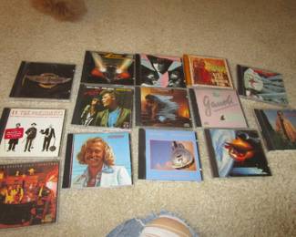 Large amount of rock CDs including local interest