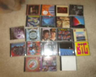 Large amount of rock CDs including local interest