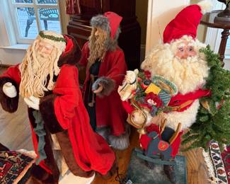 Many many collectible Santa Claus’s