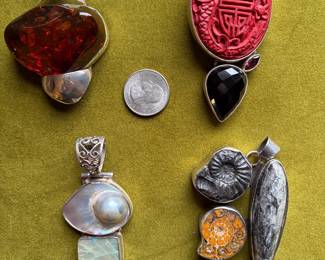 Amazing pendants- sterling silver and Amber, sterling silver,- Cinnabar and Onyx, sterling silver - Mother of pearl and Sapphire , sterling and ammonite