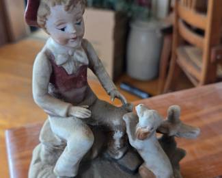 Boy and Dog Figurine