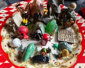 Assorted Decorative Figurines on a Decorative Plate