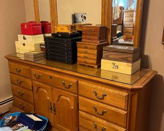 Dresser has matching tall, dresser, armoire, and sleigh bed